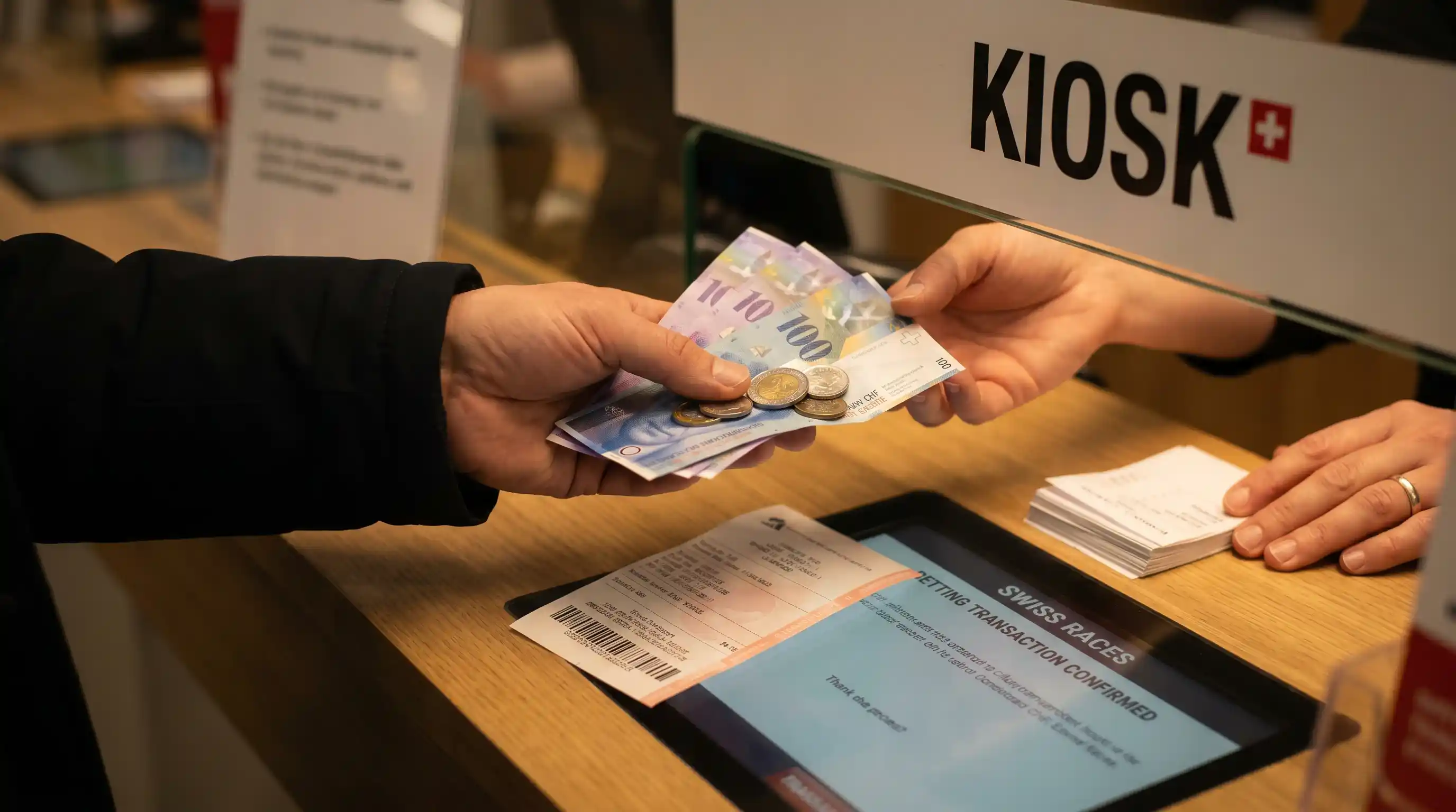 Bargeld-Auszahlung am Sporttip-Kiosk in der Schweiz — CHF 1000 Limit und Banküberweisung für höhere Gewinne